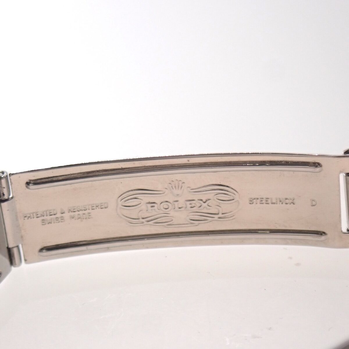 ステンレススチールのロレックスバンドの裏側の刻印, 高品質のジュエリーの詳細, ブランド刻印入りアクセサリー.